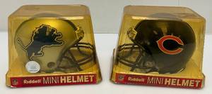 lot 73 image: Two Miniature Riddell Collectors Helmets Including Detroit Lions & Chicago Bears (New Old Stock) Plastic Yellowed
