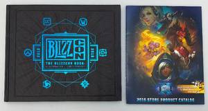 lot 83 image: Misc. BlizzCon Collectibles Including Exclusive Celebration Of Our Community  Hardcover Book & Store Product Catalog