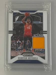 lot 172 image: Panini Prizm Donovan Mitchell Jersey Fusion Game Worn Jersey Swatch Card In Heavy Plastic Protector