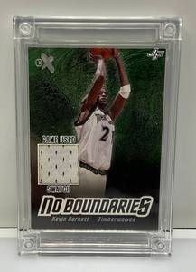lot 175 image: Fleer EX (Kevin Garnett) Timberwolves Jersey Fusion Game Worn Jersey Patch Card In Heavy Protective Plastic Sleeve