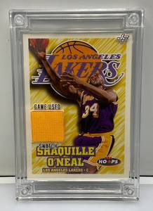 lot 187 image: NBA Hoops JF (Shaquille ONeal) Lakers Jersey Fusion Game Worn Jersey Patch Card In Heavy Protective Plastic Sleeve