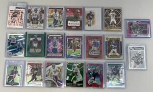 lot 214 image: Misc. Football Cards Including Tom Brady & More (In Protective Sleeves)