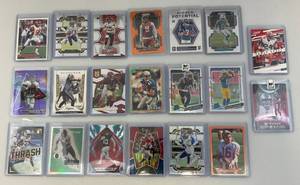 lot 215 image: Misc. Football Cards Including Joe Montana & More (In Protective Sleeves)