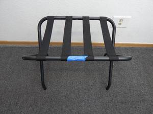 lot 32 image: Black foldable luggage rack