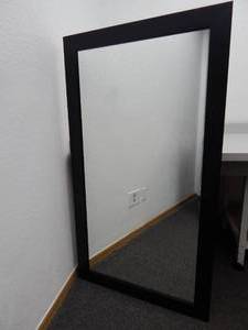 lot 64 image: Black framed mirror