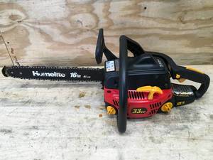 lot 113 image: Homelite Chain Saw