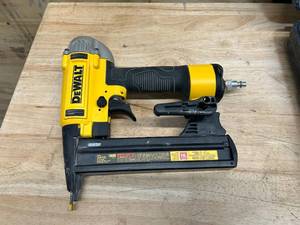 lot 89 image: DEWALT 18 GA Air Powered Fastener with Case