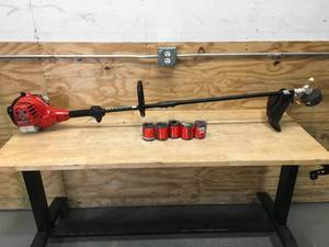 lot 170 image: Homelite 2-Stroke 26 cc Straight Shaft Gas Trimmer Model # UT26SSL3vnm