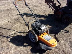 lot 76 image: Yardking 22 Walk Behind Weed Trimmer