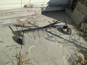 lot 23 image: Pull behind yard dethatcher...