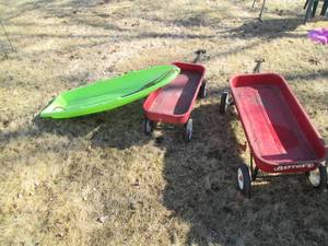 lot 31 image: Pair of Metal Radio-Flyer wagons in...