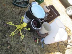 lot 40 image: Large lot of planters, pails, trash...