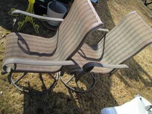 lot 41 image: Pair of Swiveling Patio chairs...