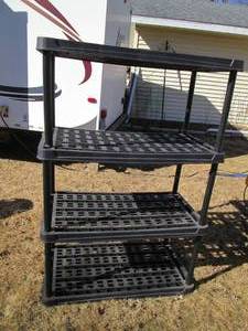 lot 44 image: Plastic 4-Tier shelving unit approx...