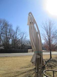 lot 47 image: 8ft adjustable offset Patio umbrell...