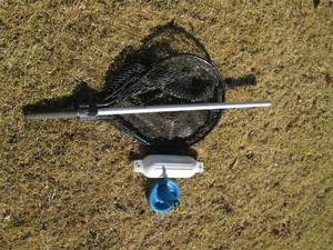 lot 56 image: Quality rubberized fishing net, buo...