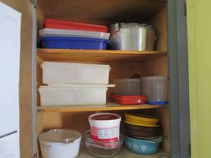 lot 65 image: Cupboard of Tupperware, Pyrex and o...