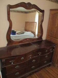 lot 108 image: Ornately carved Vintage 8-drawer la...