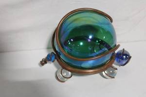 lot 21 image: Decorative Glass Sphere with Metal Accents