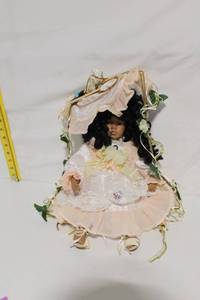 lot 26 image: Vintage Hanging Doll with Pink Dress and Bonnet