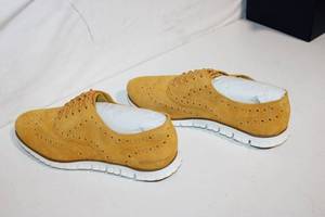 lot 252 image: Pair of Yellow Suede Lace-Up Shoes with White Soles