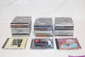 lot 295 image: Collection of 29 Music CDs with Diverse Artists and Genres