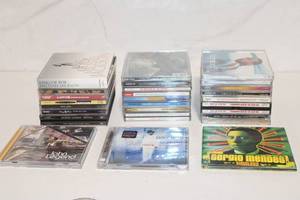 lot 302 image: Lot of 25 Music CDs Including John Legend, Michael Jackson, and Sergio Mendes