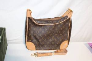 lot 2 image: Louis Vuitton Monogram Canvas Handbag with Adjustable Strap - Not Authenticated