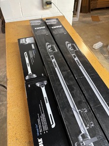 lot 44 image: (2) Thule Paceline Roof Racks and Wheel Holders - NEW