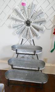 Super cute windmill planter stand