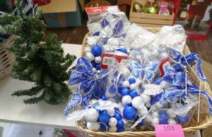 Basket full of Blue and white plus a small tree