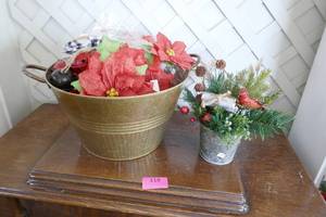 Metal bucket full of flowers and bells and a fully made for you metal planter dcor piece