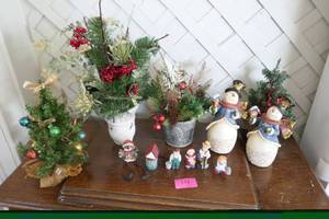 Group of holiday dcor items and greenery