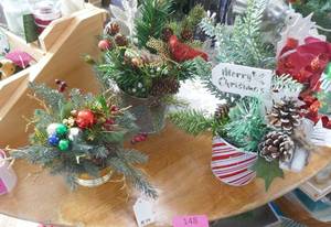 3 very pretty arrangements in metal containers