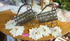 2 fun metal wine holders and some flowers