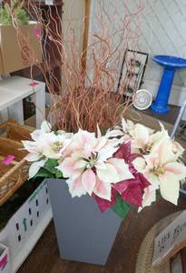New plastic planter full of faux flowers