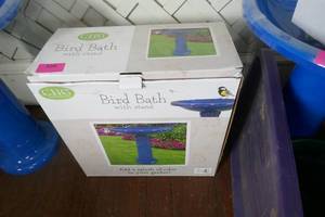 Blue plastic bird bath New in box
