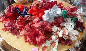 Large table full of bows
