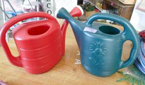 Two new plastic watering cans - 2 gallon