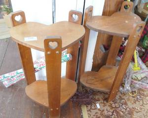 Two wood stands with heart shaped shelves