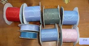 6 rolls of 3 inch Moire ribbon and 2 smaller