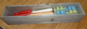 wood planter box full of candles