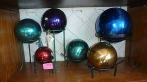 6 gazing balls with stands in various condition