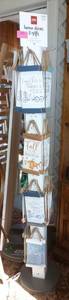 Rotating Display with wall hangings 66 inches tall