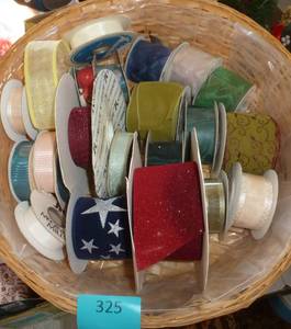 Basket of approx 19 rolls of ribbon