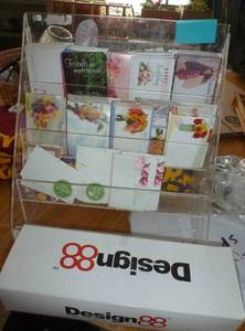 display of note cards for flowers and full box of envelopes