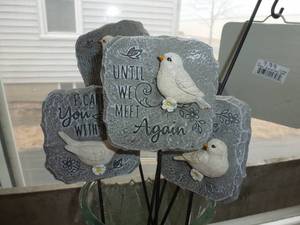 Group of memorial message stones with hangers