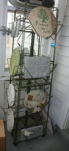 Store display full of large messagestepping stones or wall hangings etc