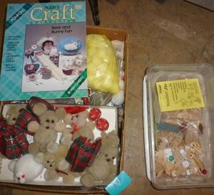 Box full of supplies for pompom bears and other small crafts