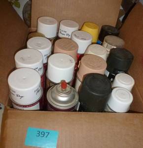 box full of flower paint and some enamel paint